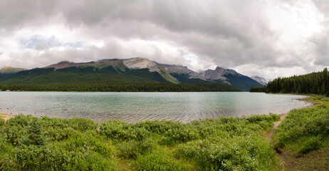 Maligne Lake in cloudy day in summer in Jasper in Banff National Park, Alberta, Canada