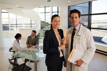 Fototapeta premium Doctors talking in hospital corridor