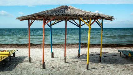 Old wooden shed on the beach