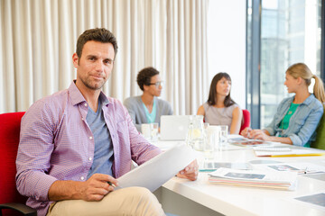Portrait of businessman in meeting