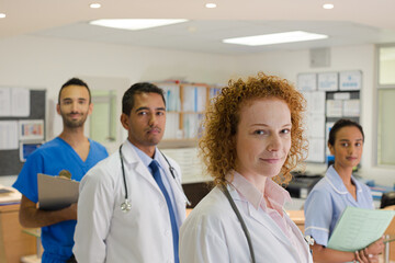 Doctors and nurse smiling in hospital