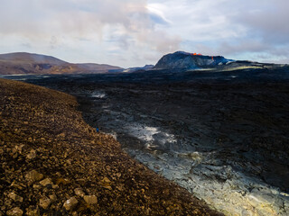 Impressive aerial view of the exploding red lava from the Active Volcano in Iceland