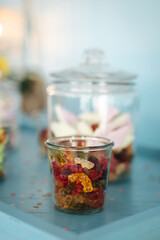 Delicious candy in a glass jar close-up