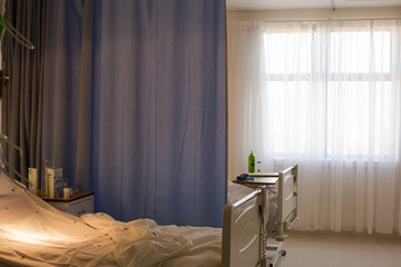 View of empty  bed in hospital room