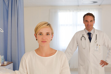 Doctor and patient in hospital room