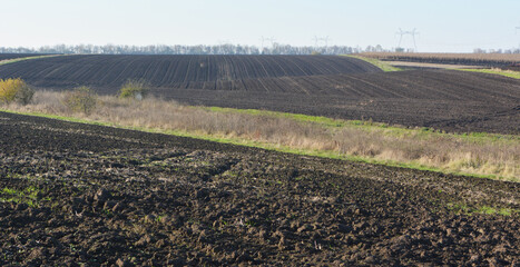 Landscape with a plowed field