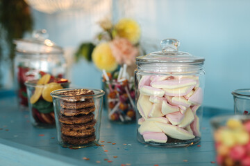 Delicious candy in a glass jar close-up