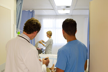 Fototapeta premium Doctors standing in hospital room