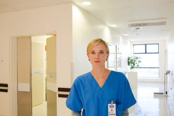 Doctor standing in hospital hallway