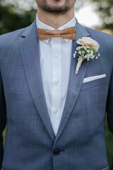 Groom wearing a bow tie on his wedding day close-up