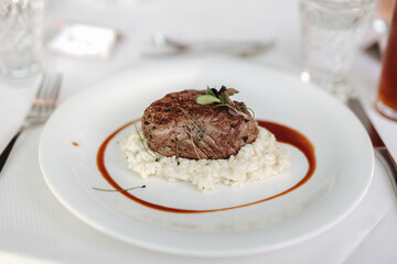 Steak on a plate at a dinner 