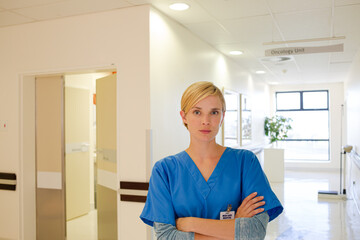 Doctor standing in hospital hallway