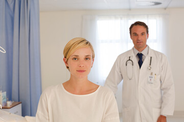 Doctor and patient in hospital room