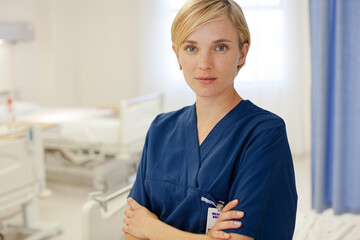 Nurse standing in hospital hallway