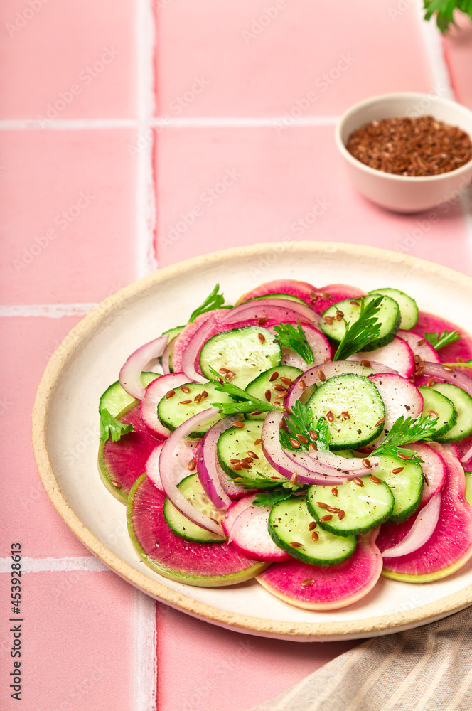 Poster Salad with watermelon radish, cucumber and red onion