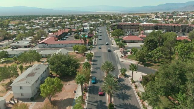 Aerial: Flying over traffic in Boulder City,  Nevada, USA
