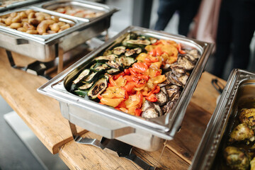 Grilled vegetables in a silver tray at a buffet
