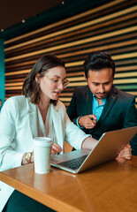 business people working together on the computer