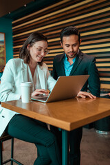 business people working together on the computer