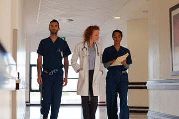 Hospital staff walking in hallway