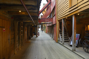 Historic colorful wooden buildings in Bryggen, the Hanseatic quarter dating back to the 14th...