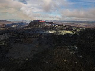 Impressive aerial view of the exploding red lava from the Active Volcano in Iceland