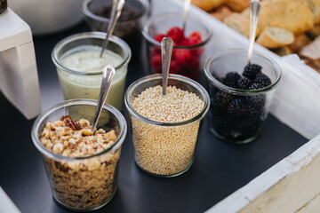 Nuts seeds and berries at a breakfast buffet