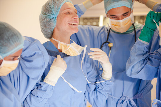 Surgeons talking in operating room