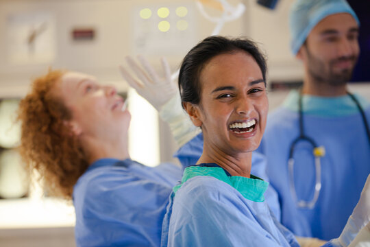 Surgeons talking in operating room