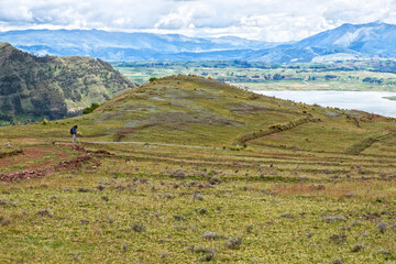 Woman doing trekking in the Andes