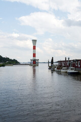 view of the lighthouse by the coast during a rainy afternoon