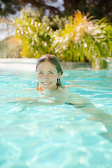 Woman swimming in pool