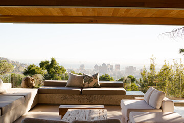 Sofas and coffee table on modern balcony