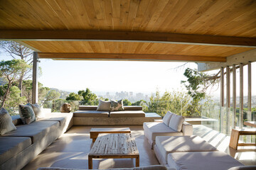 Sofas and coffee table on modern balcony