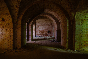 Fototapeta premium Vaulted red brick dungeon under old mansion
