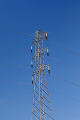 Electrification tower with blue sky.