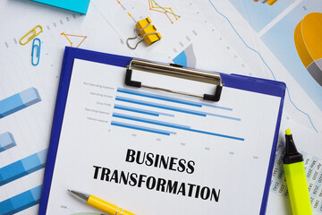 Financial concept meaning Business Transformation with sign on the piece of paper.