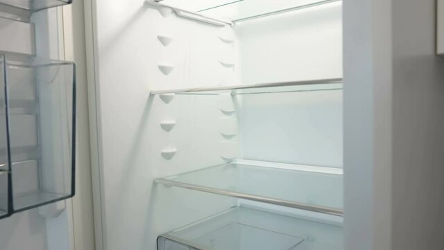 An empty refrigerator in the kitchen with the drawers inside in Estonia