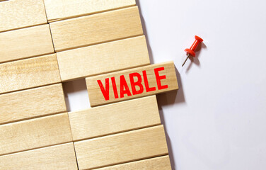 word Viable on wooden block. wooden background