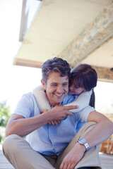 Obraz premium Father and daughter hugging outdoors