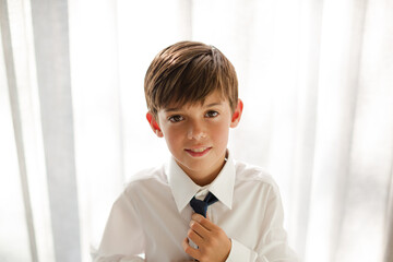 Boy  wearing shirt and tie, smiling