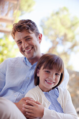 Fototapeta premium Father and daughter hugging outdoors