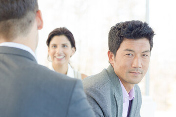 Businessman smiling in meeting