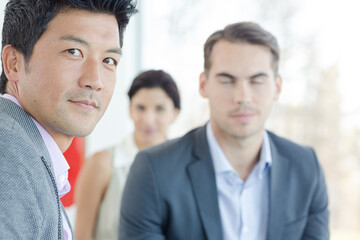 Business people smiling on sofa