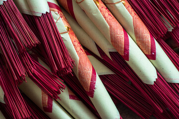group of incense already bundled with prayer paper at the buddhist temple