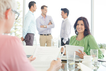 Business people talking in meeting