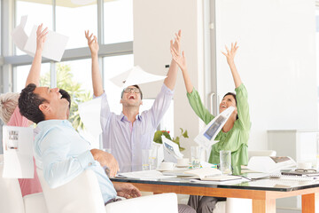 Fototapeta na wymiar Business people cheering in meeting
