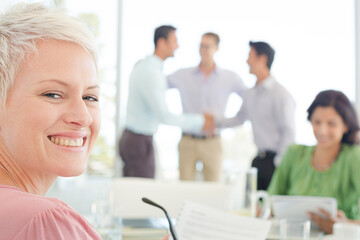 Fototapeta premium Businesswoman smiling in meeting