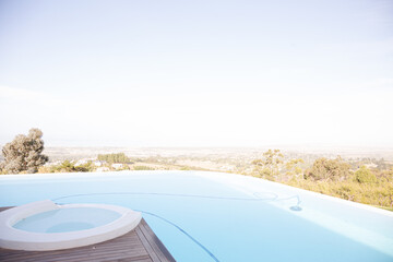 Obraz na płótnie Canvas Infinity pool overlooking hillside