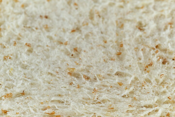 close up shot of a surface texture of sliced whole wheat sandwich bread for food background wallpaper